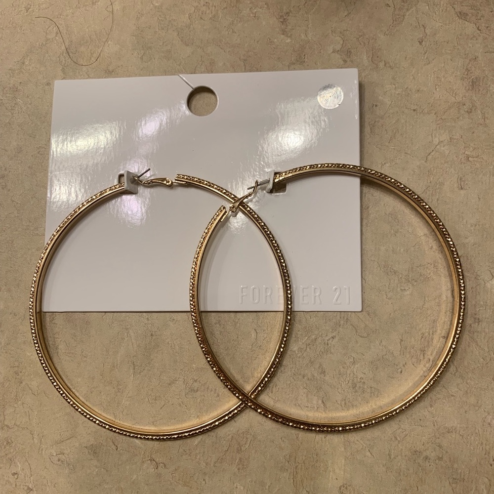 Jumbo gold earrings